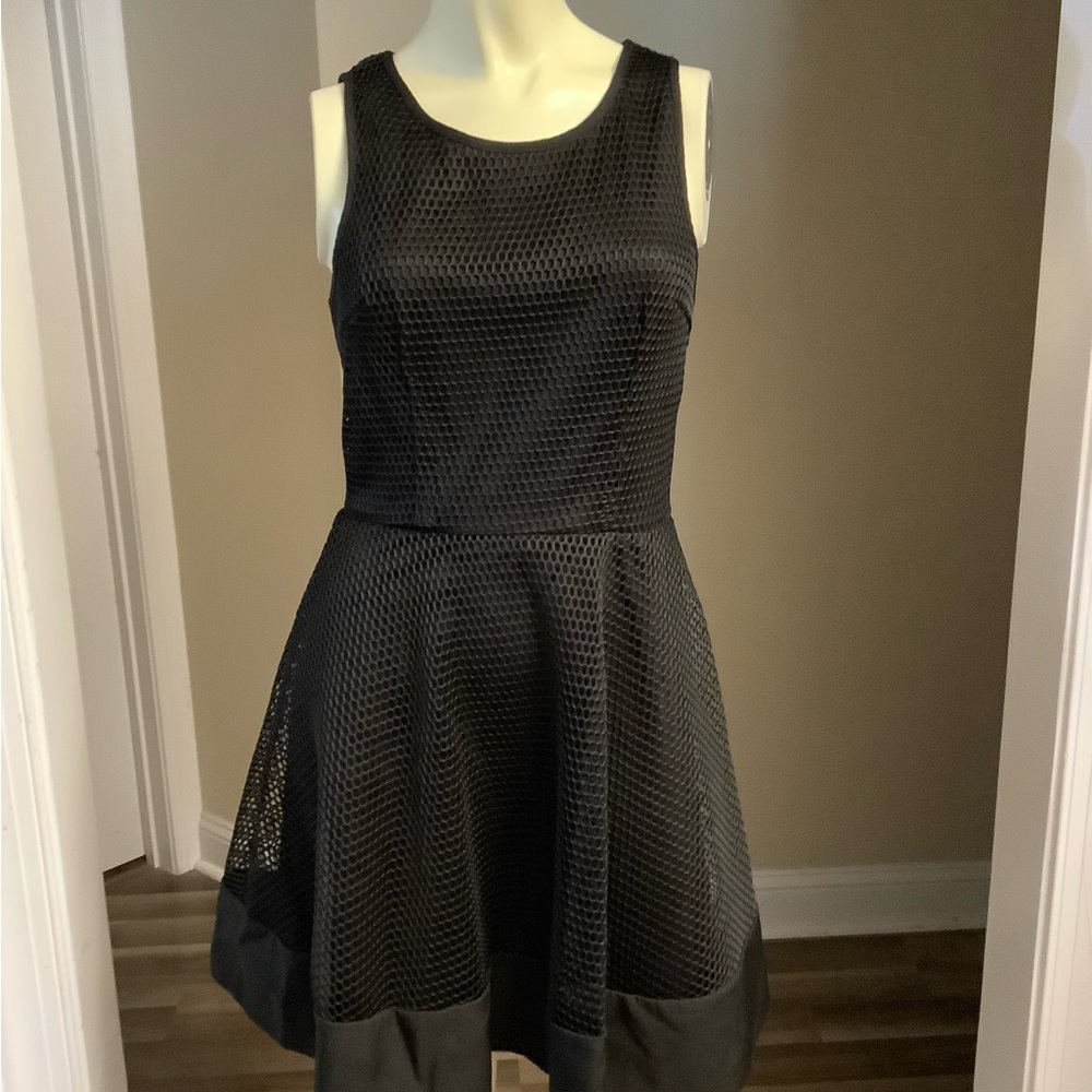 Forever 21: Fishnet Little Black Dress
SizeM Back Zip Closure Sleeveless